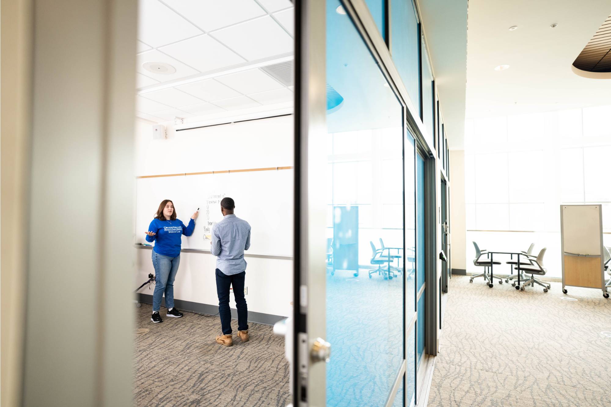 two people talking in healthcare setting